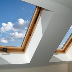 skylight windows, blue sky with puffy white clouds